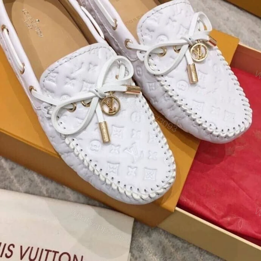 View 3 of LOUIS VUITTON WHITE MONOGRAM EMPREINTE LEATHER GLORIA LOAFERS