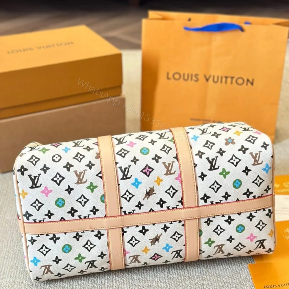 View 4 of Louis Vuitton Keepall Bandoulière Vanilla 40Cm M25233