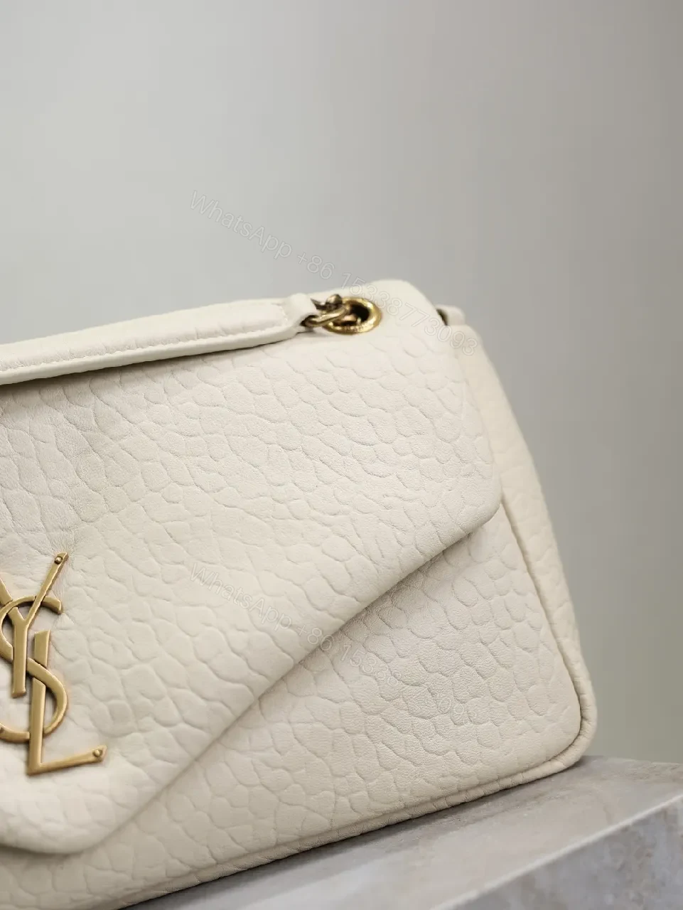 View 8 of Ivory Pebbled Leather Chic Handbag with Gold Hardware