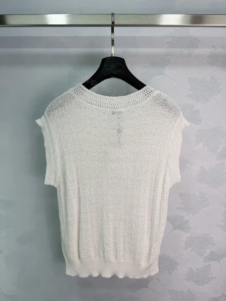 View 2 of White boucle knit relaxed-fit sweater with Chanel logo
