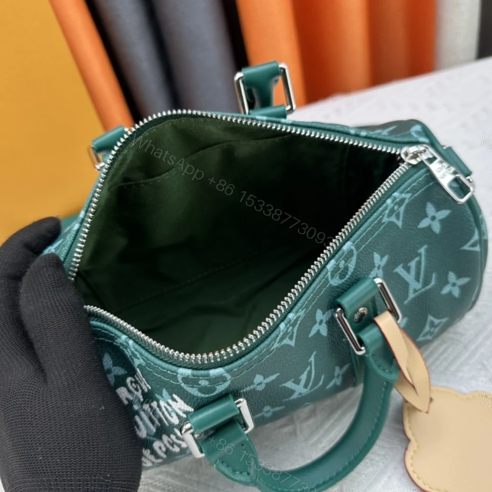 View 9 of Louis Vuitton Keepall Bandoulière 25 Monogram Green 25Cm
