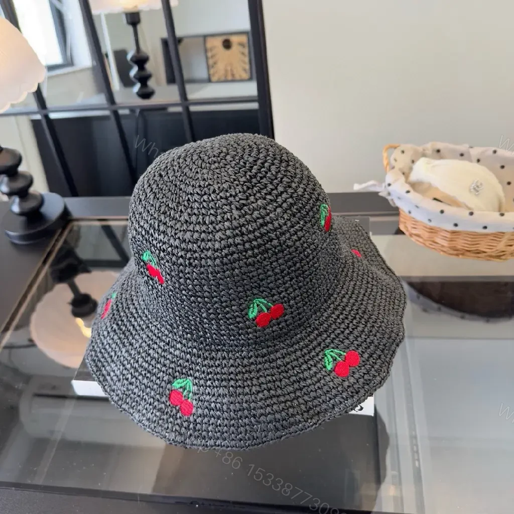 View 6 of Charcoal Crochet Bucket Hat with Cherry & LV Accent