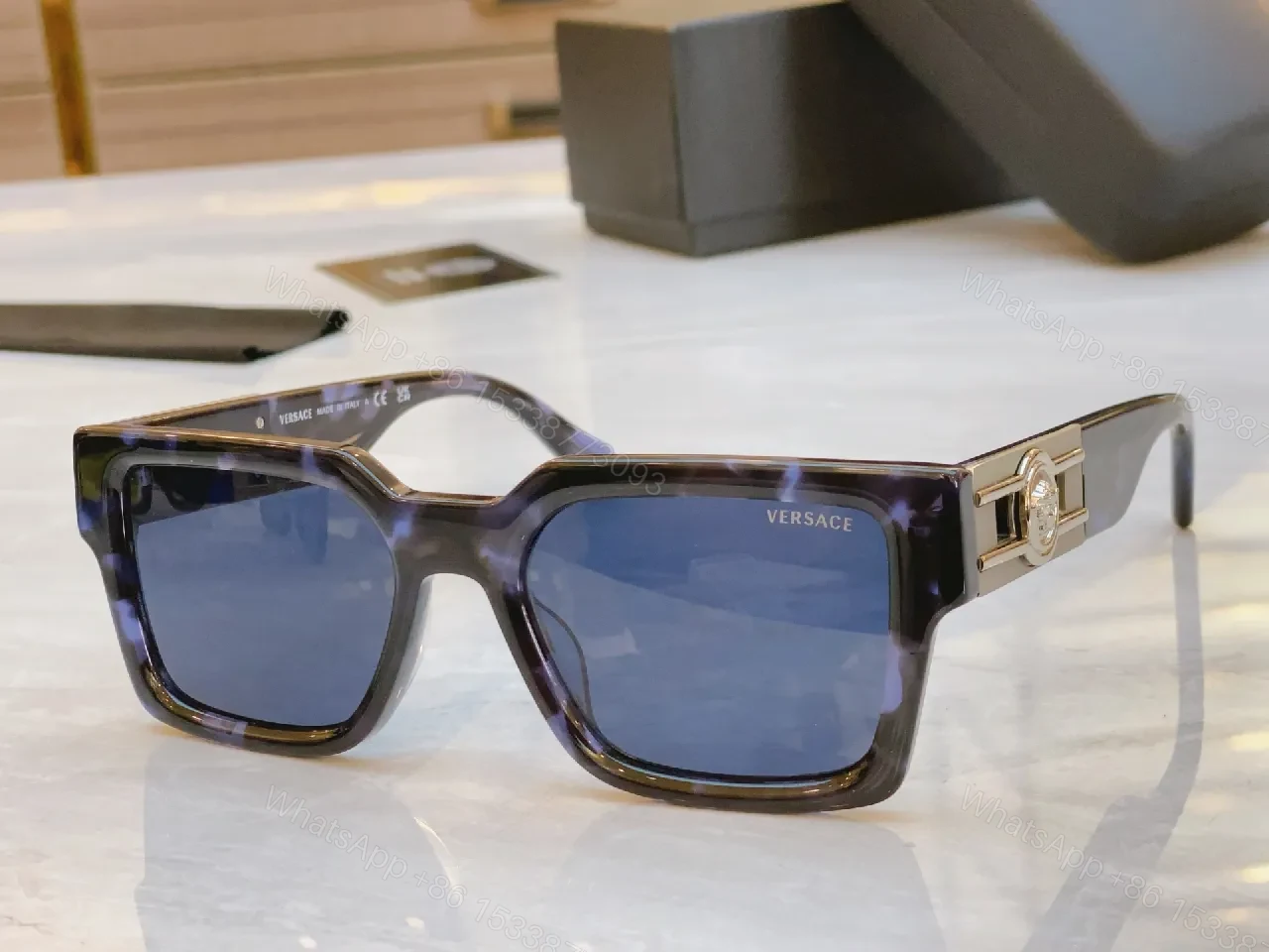 Deep Tone Frame Luxe Sunglasses with Signature Hardware — view 1