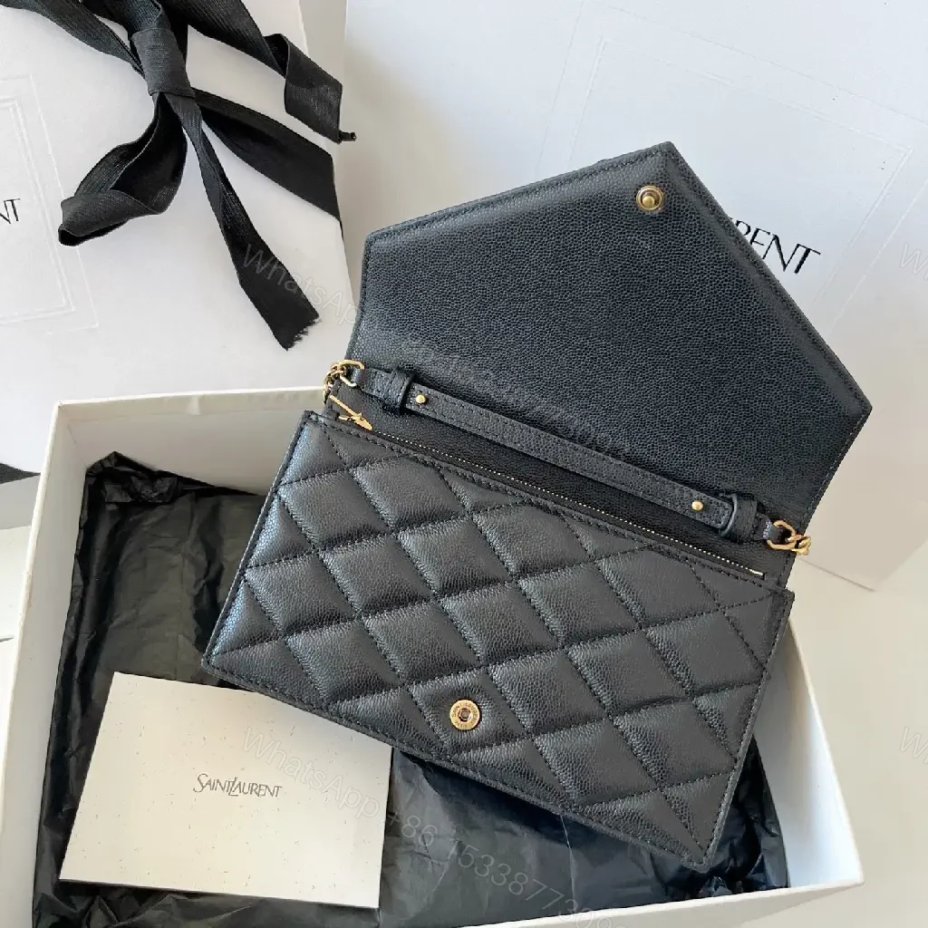 View 2 of Black Diamond Quilted Leather Flap Crossbody Bag with YSL Monogram Clasp