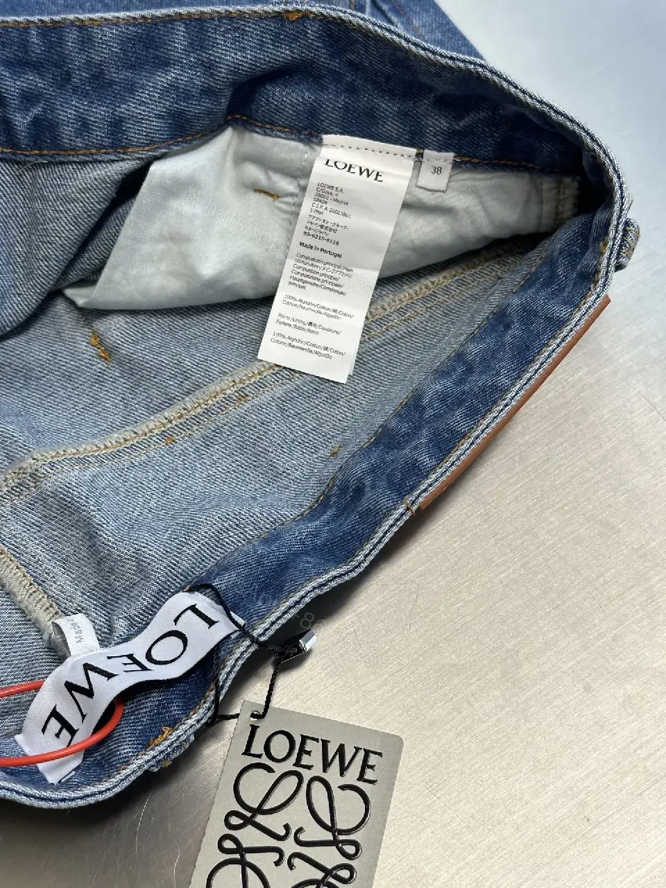View 6 of Denim Shorts: White Embroidered Logo, Relaxed Fit, Luxe Style