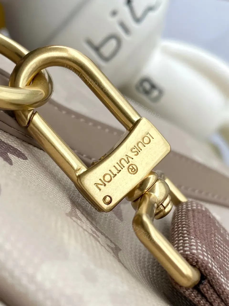 View 9 of Light Taupe LV Monogram Duffle — Canvas, Leather Trim, Top Zip, Recessed Gold Hardware