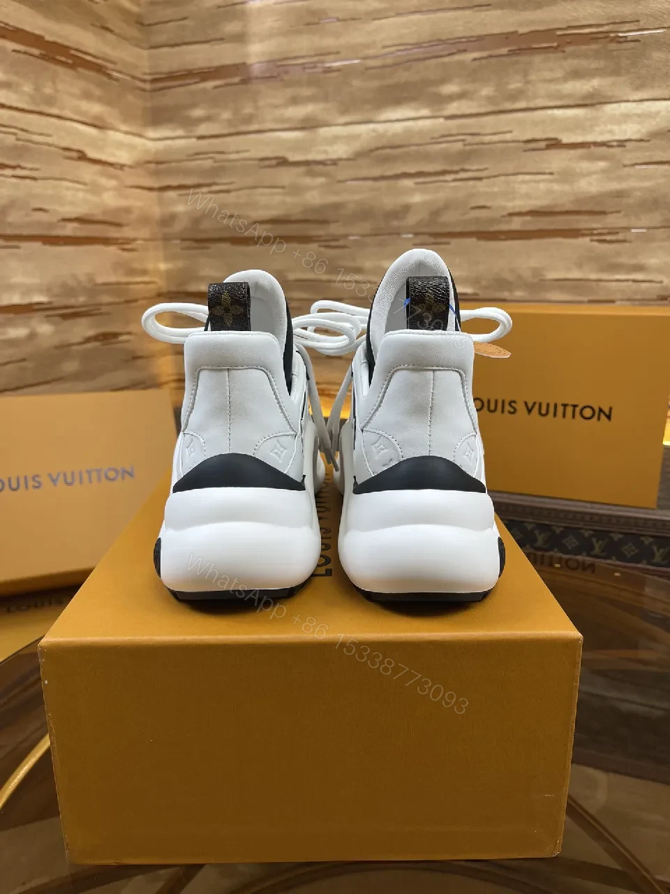 View 6 of Premium Leather High-Top Sneakers with LV Embellishments