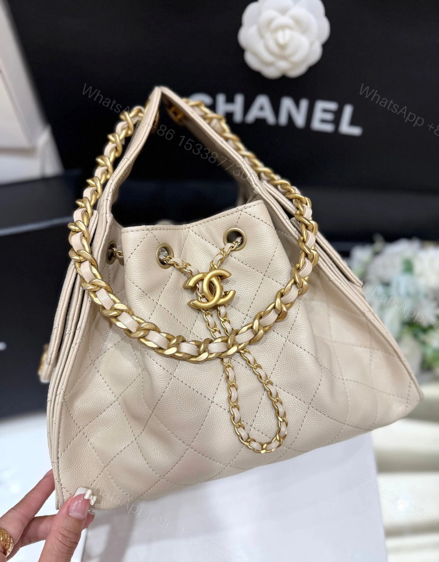 View 3 of CHANEL 25 HANDBAG IN CREAM 30 GRAINED CALFSKIN GOLD HARDWARE