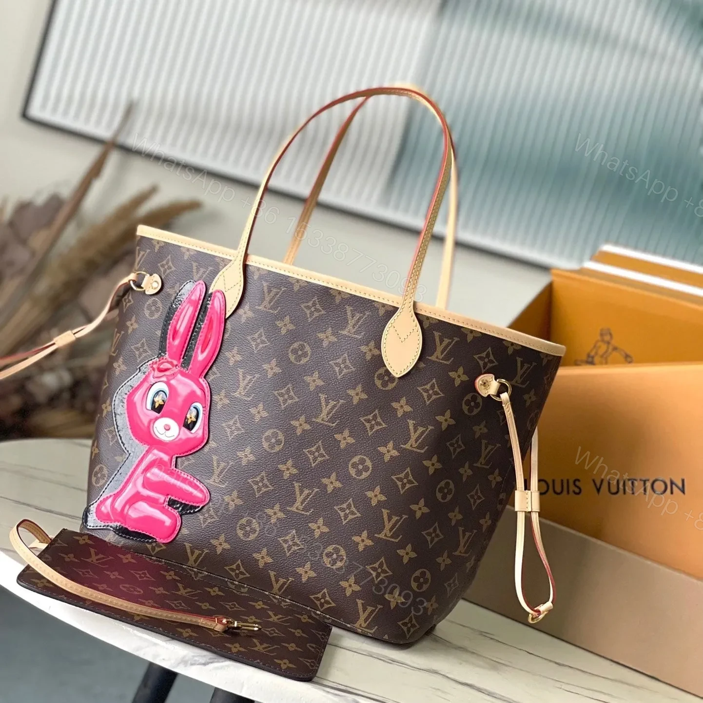 LV NEVERFULL MM IN BROWN MONOGRAM CANVAS WITH PINK RABBIT PATCH — view 1