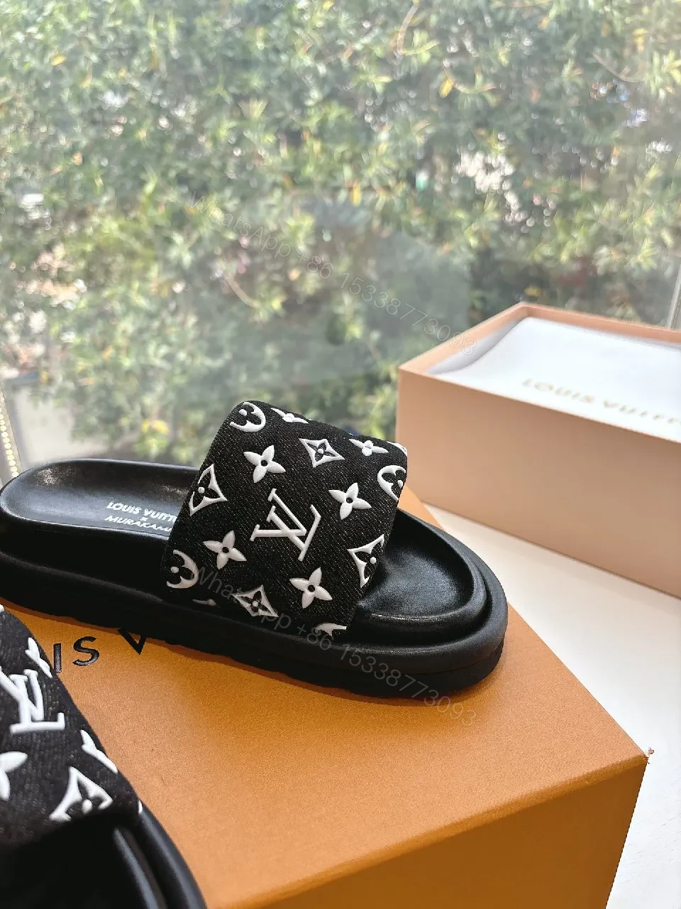 View 3 of Black Monogram Slide with LV Motif — Luxury Comfort Sandal