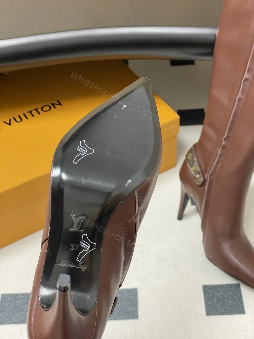 View 2 of Brown Leather Knee-High Boots with LV-Accent Details