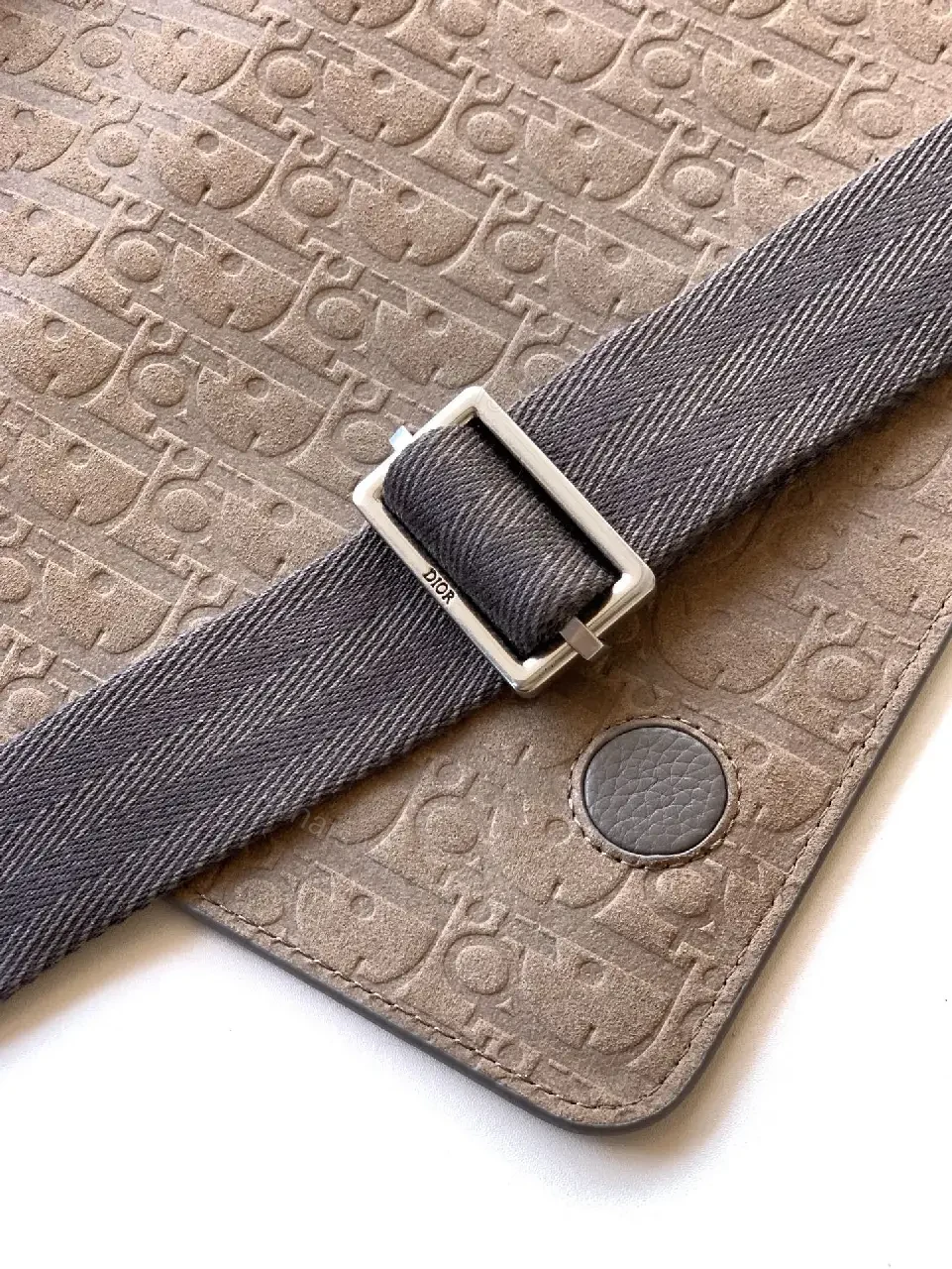 View 7 of Pebble Leather Crossbody: Subtle Branding, Quiet Luxury