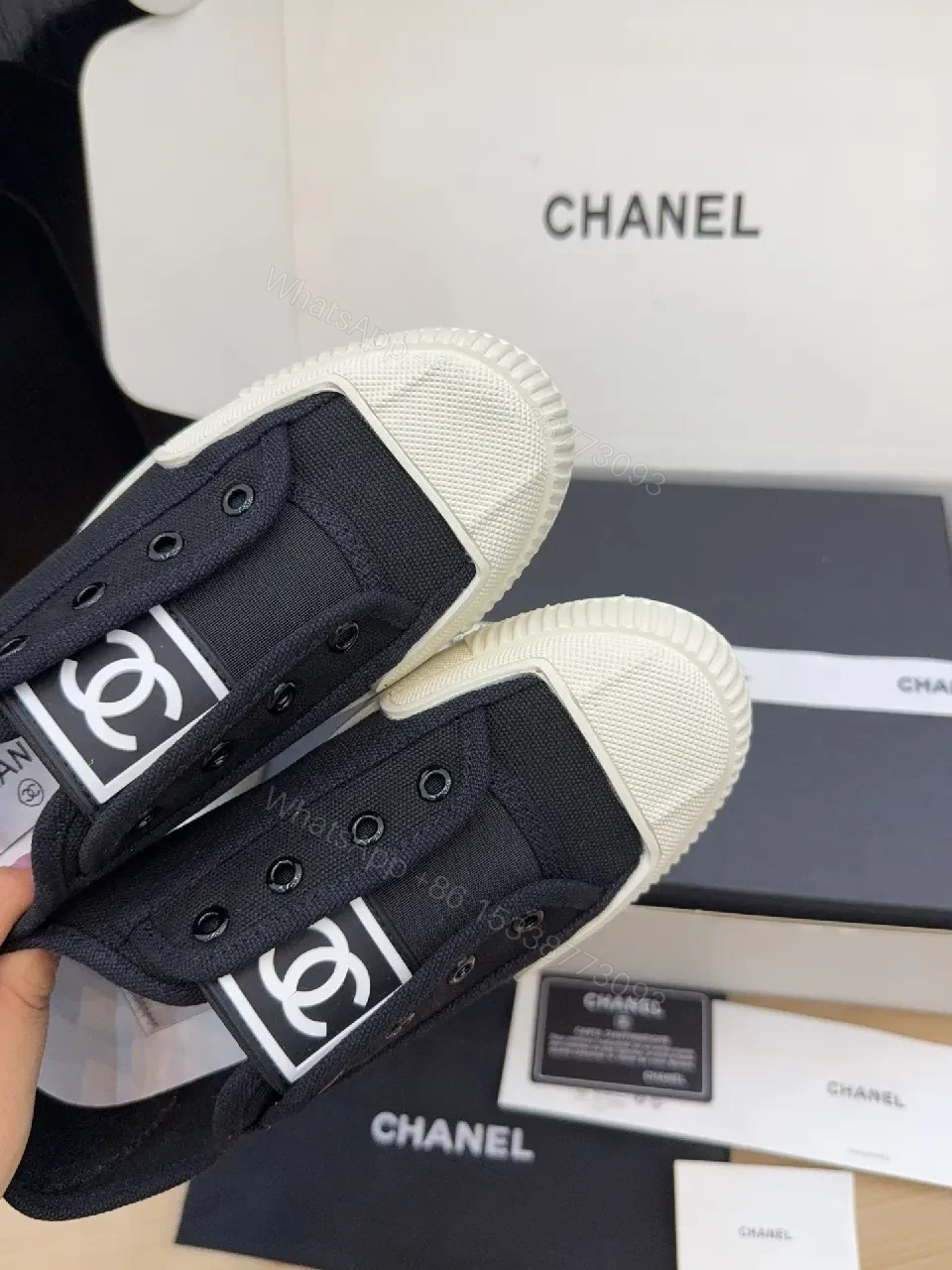 View 4 of Minimalist Black Canvas Sneakers with Logo Strap