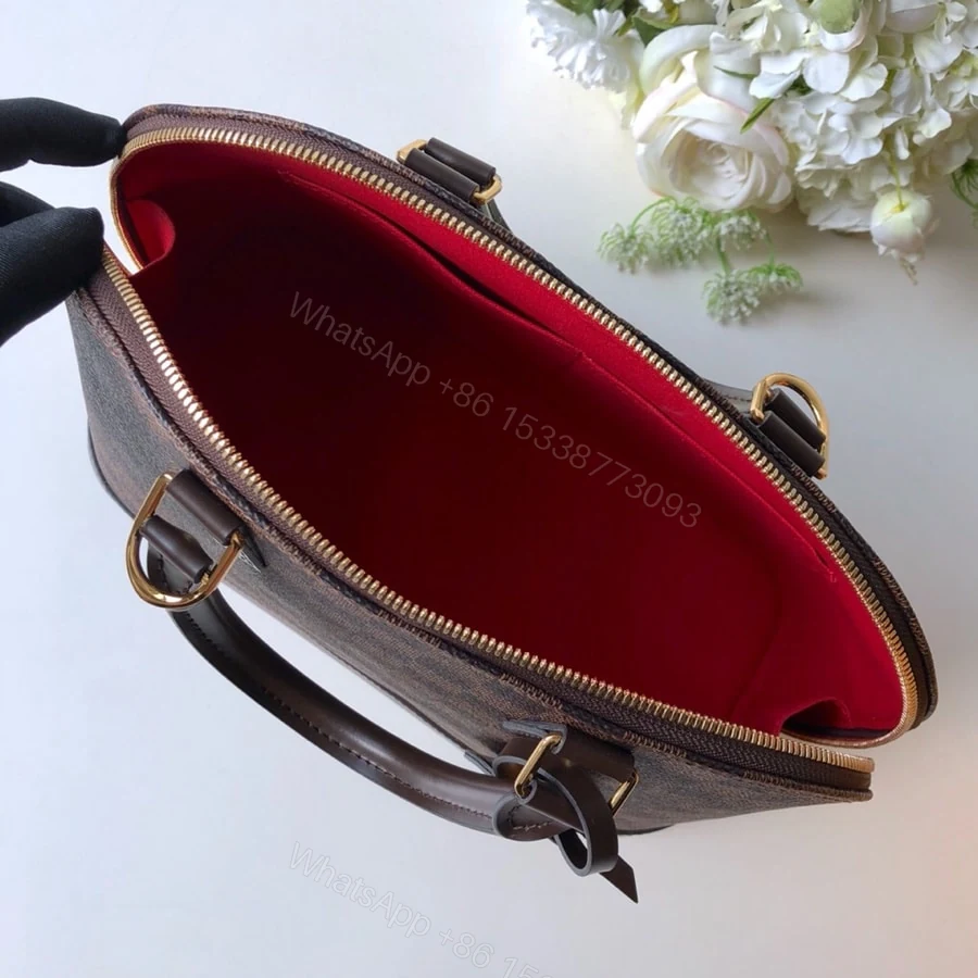View 8 of Louis Vuitton Alma PM Damier Ebene Brown 32Cm N53151