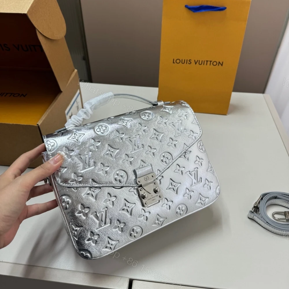 View 2 of Louis Vuitton Pochette Métis Silver 25Cm