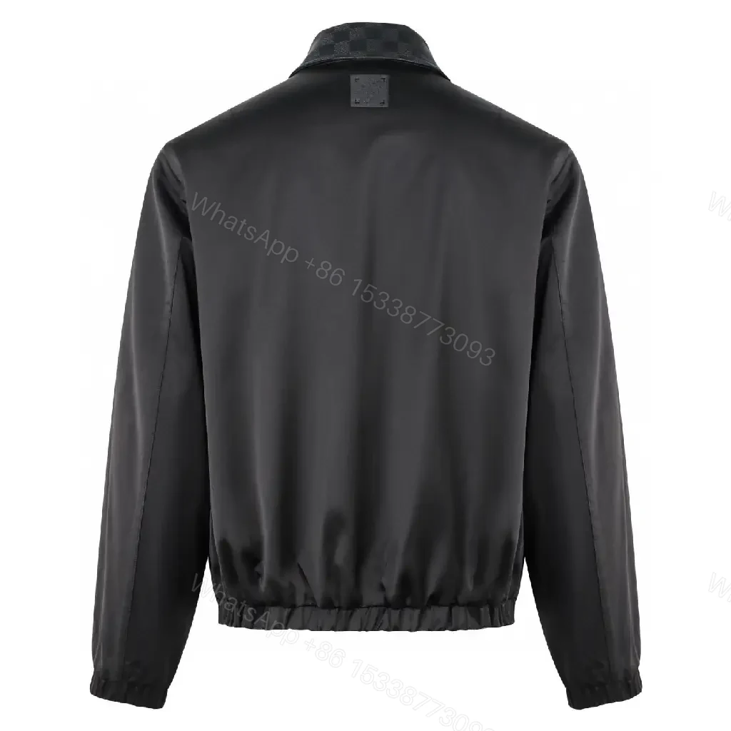 View 9 of Black Leather-Trim Coach Jacket with Subtle Logo Embroidery