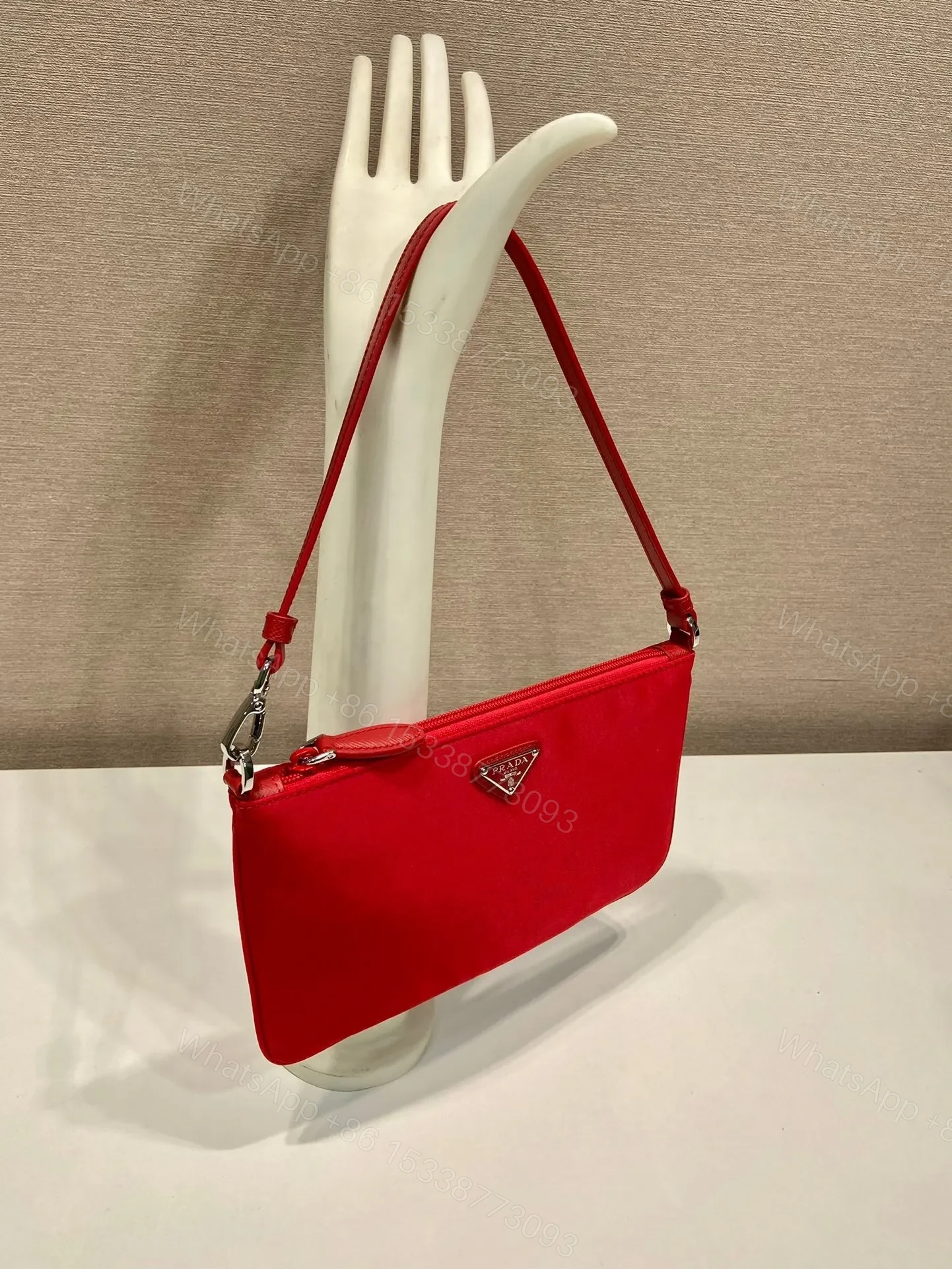 View 5 of SHOULDER BAG 24 WITH TRIANGLE LOGO IN PASSION RED RE-NYLON FABRIC