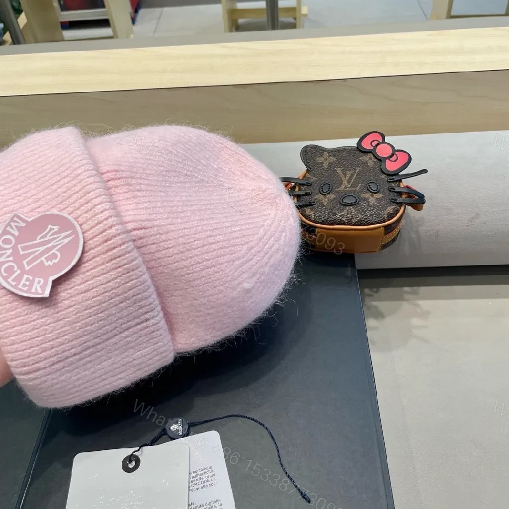 View 8 of Soft Pink Wool Beanie: Luxe Moncler Patch, Cozy Everyday Wear