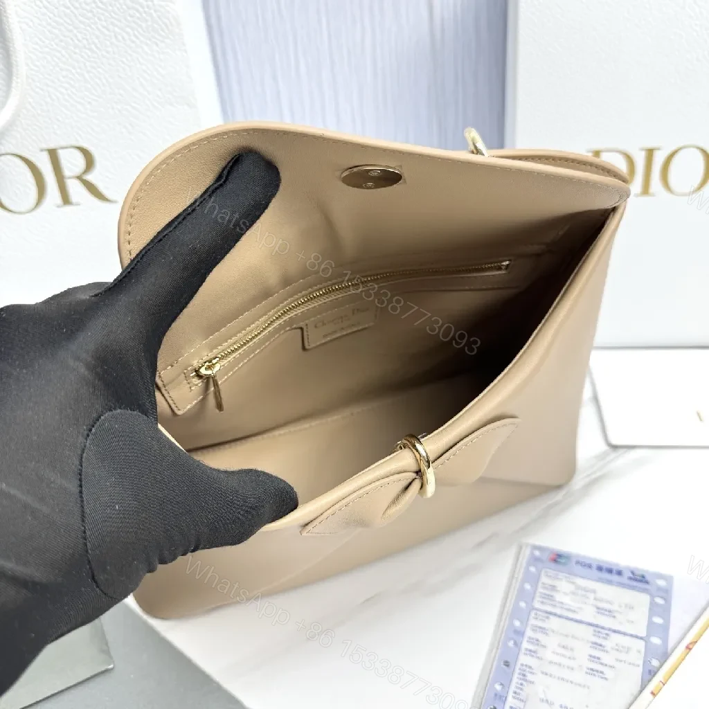 View 7 of Geometric Leather Mini Bag: Chic Bow Accent, Gold Hardware