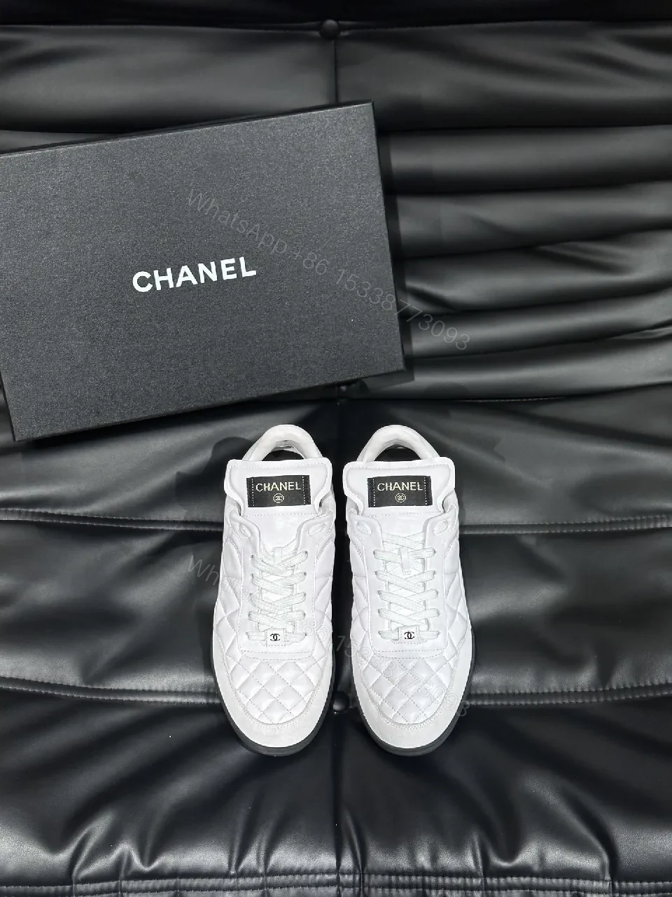 White Quilted Low-Top Sneakers with Chanel-Inspired Detail — view 1