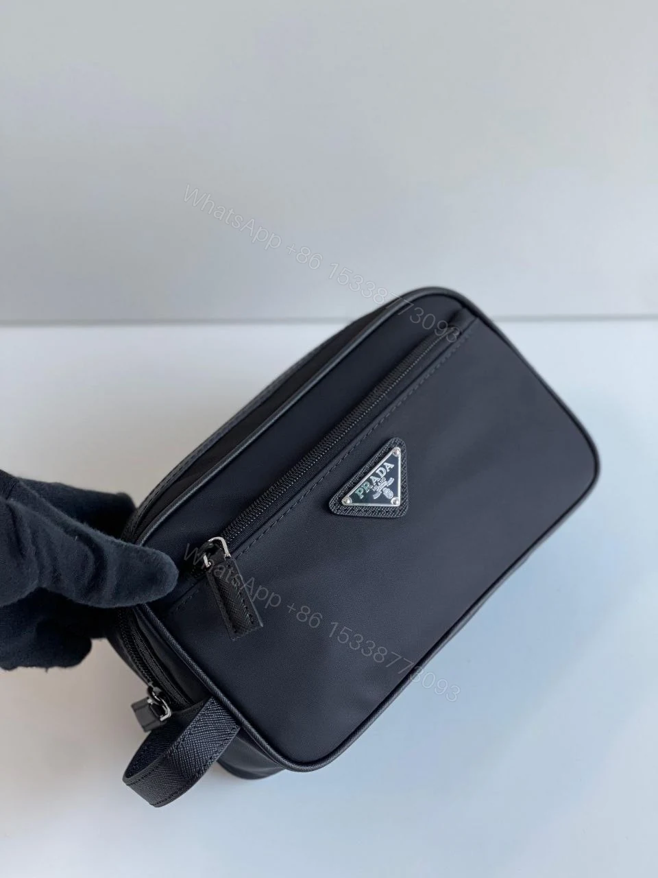 View 2 of Re-Nylon and Saffiano leather travel pouch Leather handle