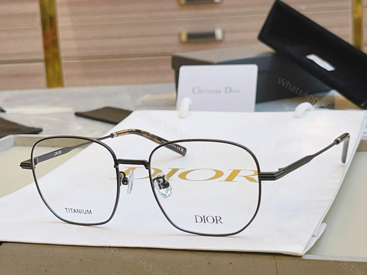 View 7 of Elegant Titanium Rim Eyewear: Subtle Designer Accents Suiting Any Look