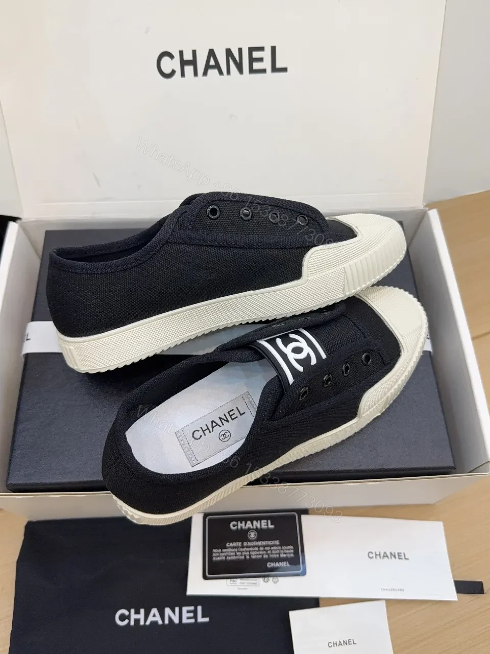 View 7 of Minimalist Black Canvas Sneakers with Logo Strap