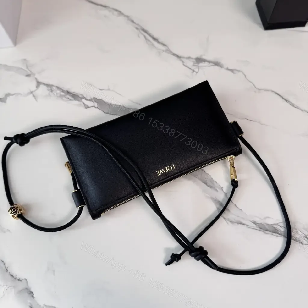 View 5 of Chic Black Leather Crossbody with Gold Hardware