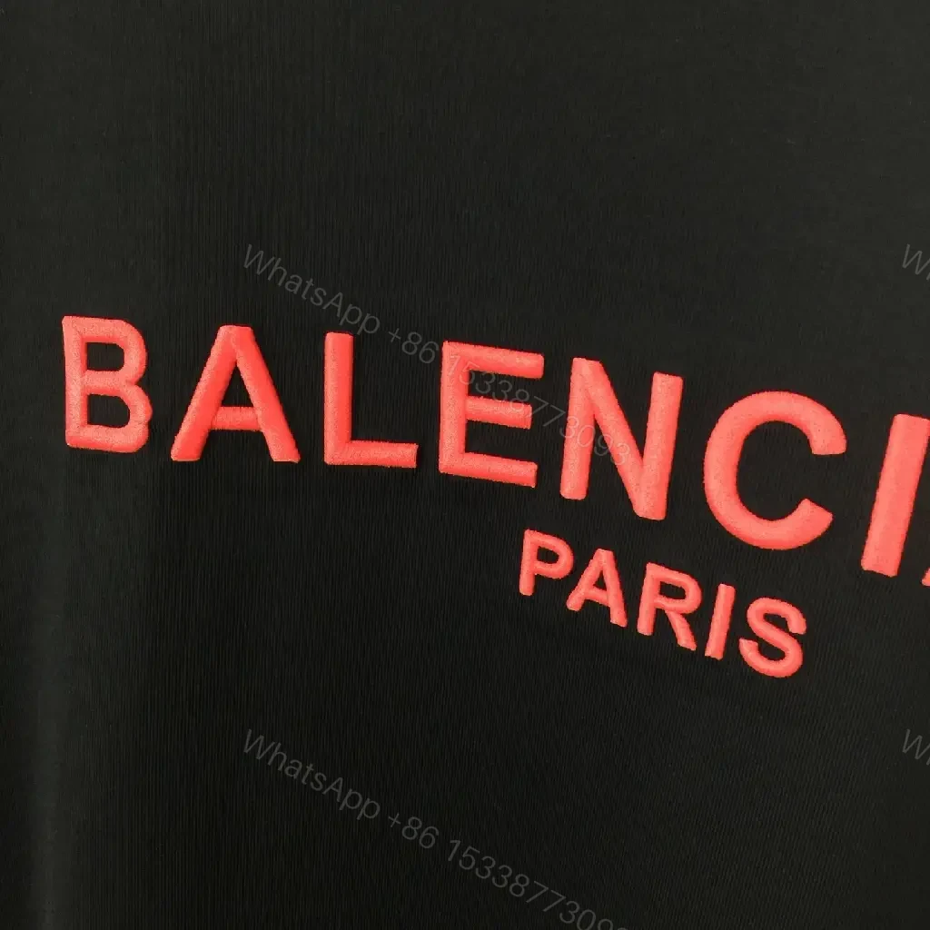View 2 of Black Cotton Tee — Elevated Streetwear Logo Tee
