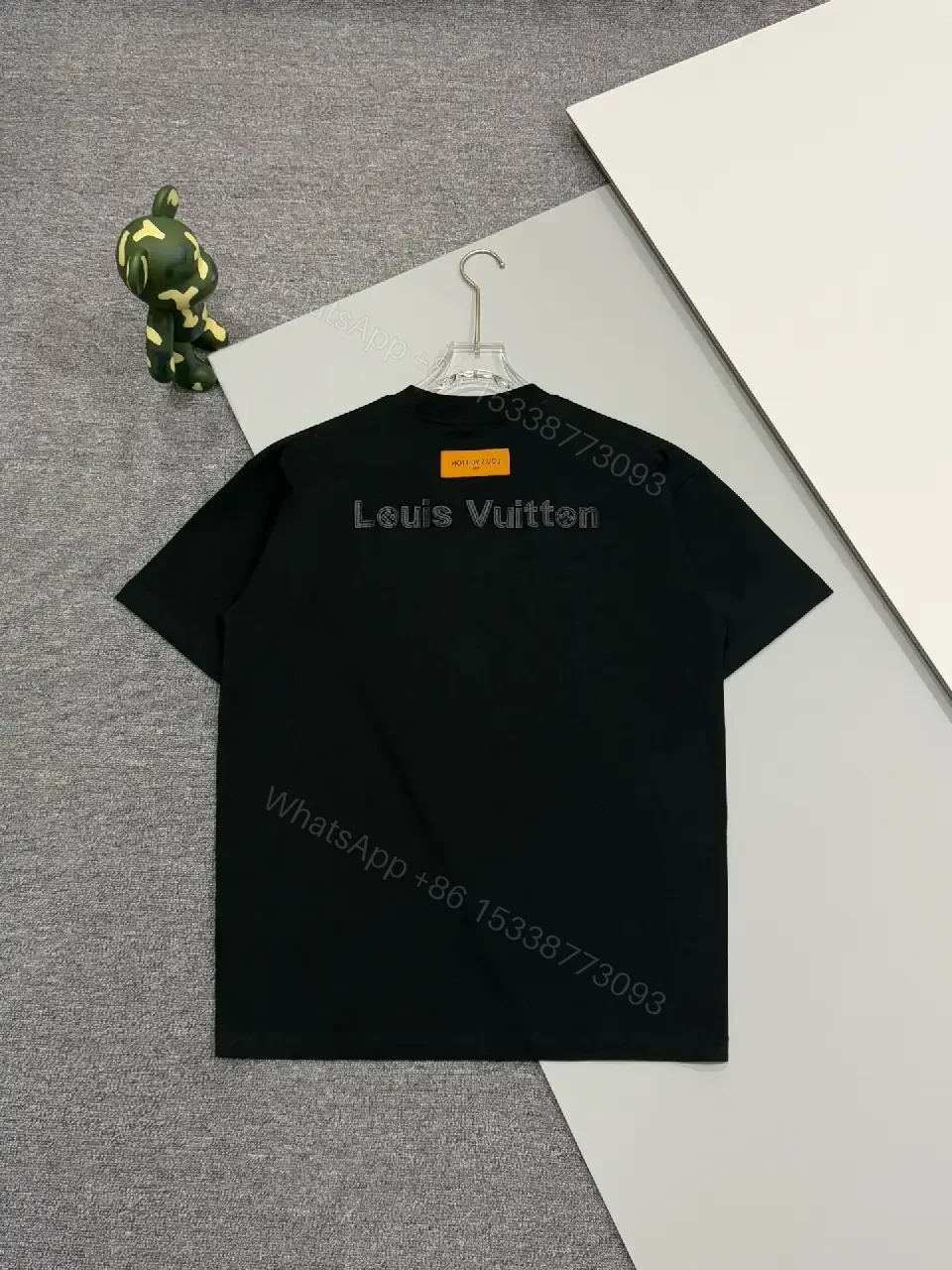 View 2 of Premium Black Tee — Discreet Logo, Soft Cotton Blend, Structured Fit