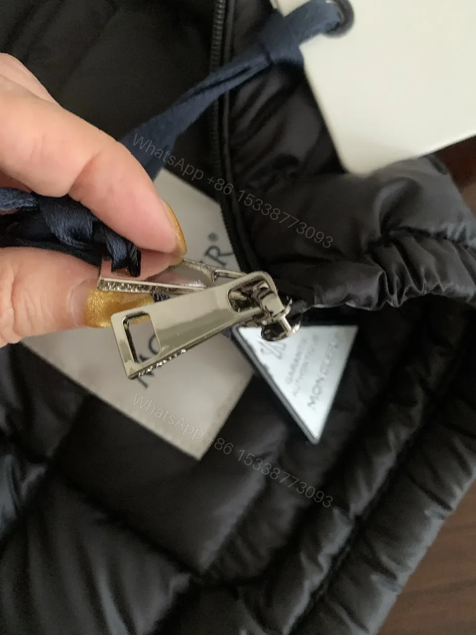 View 7 of Black Nylon Puffer Jacket: Sleek, Insulated Warmth with Patch