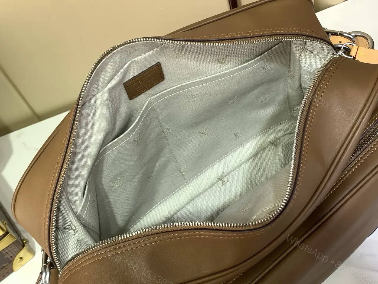 View 7 of Brown Leather Minimalist Messenger Bag with Subtle Stitching Details