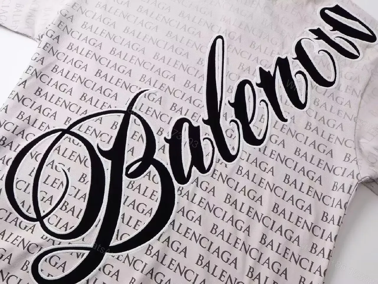 View 7 of Bold Monogram Tee: White Cotton with All-Over Black Script Pattern
