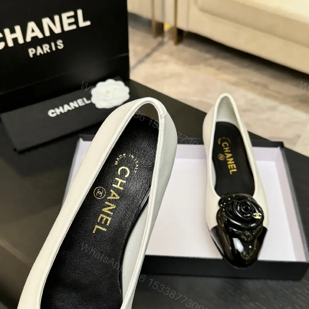 View 2 of Chic White & Black Ballet Flats with Rose Embellishment