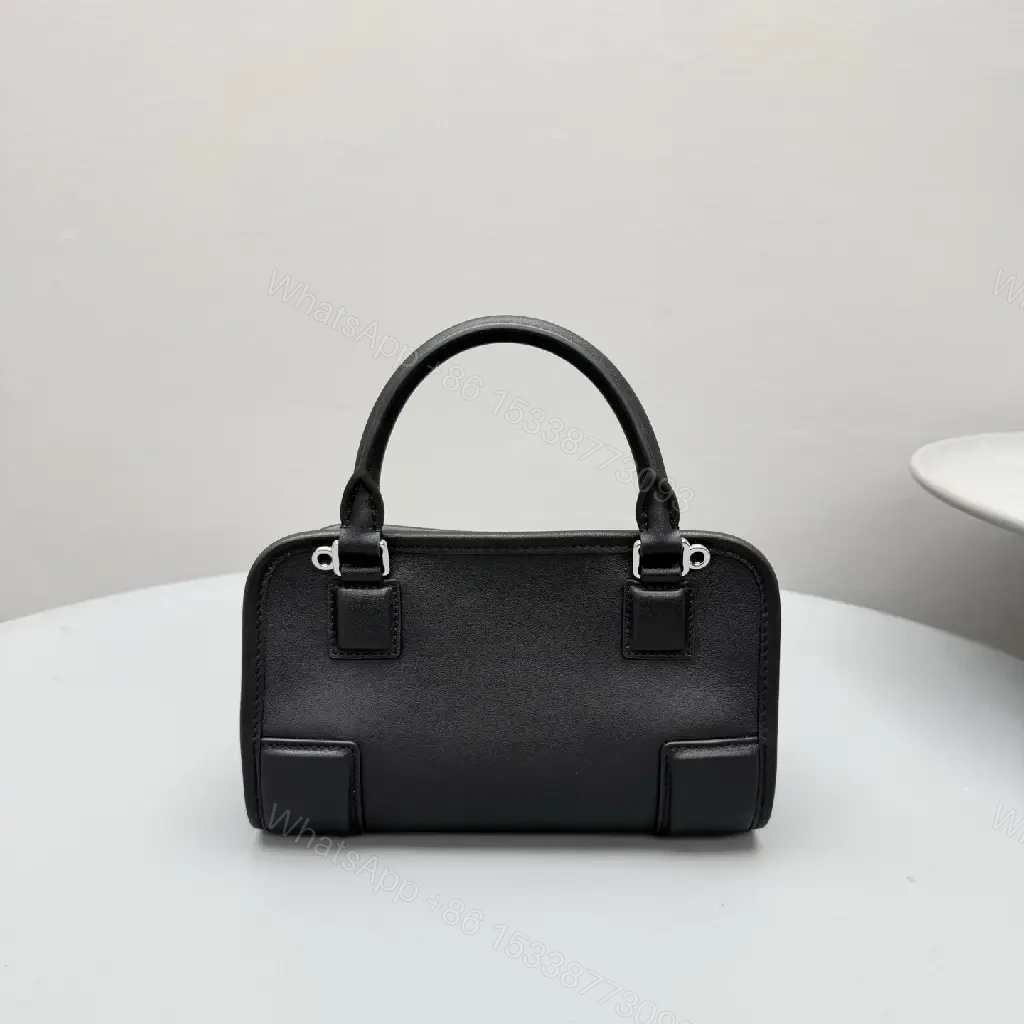 View 5 of Structured Black Leather Mini Bag | Compact, Versatile Carryall