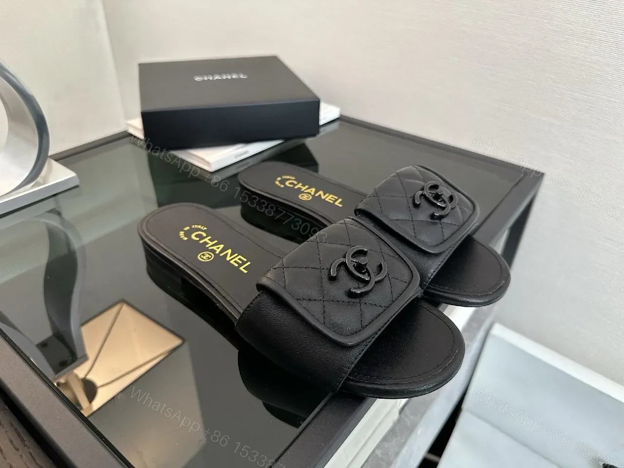 View 5 of Chic Black Quilted Slides with Logo Detailing