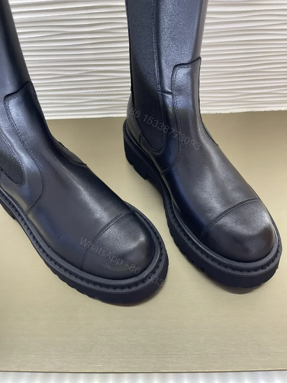 View 9 of Chic Knee-High Boots with Signature Hardware Leather-Luxe Style