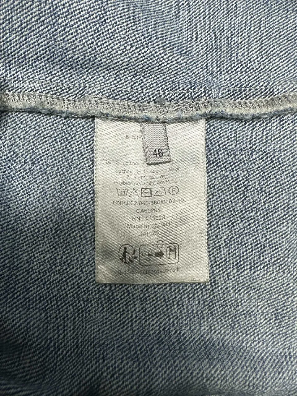 View 2 of Indigo Denim Coach Jacket – Subtle Dior Branding, Modern Texture