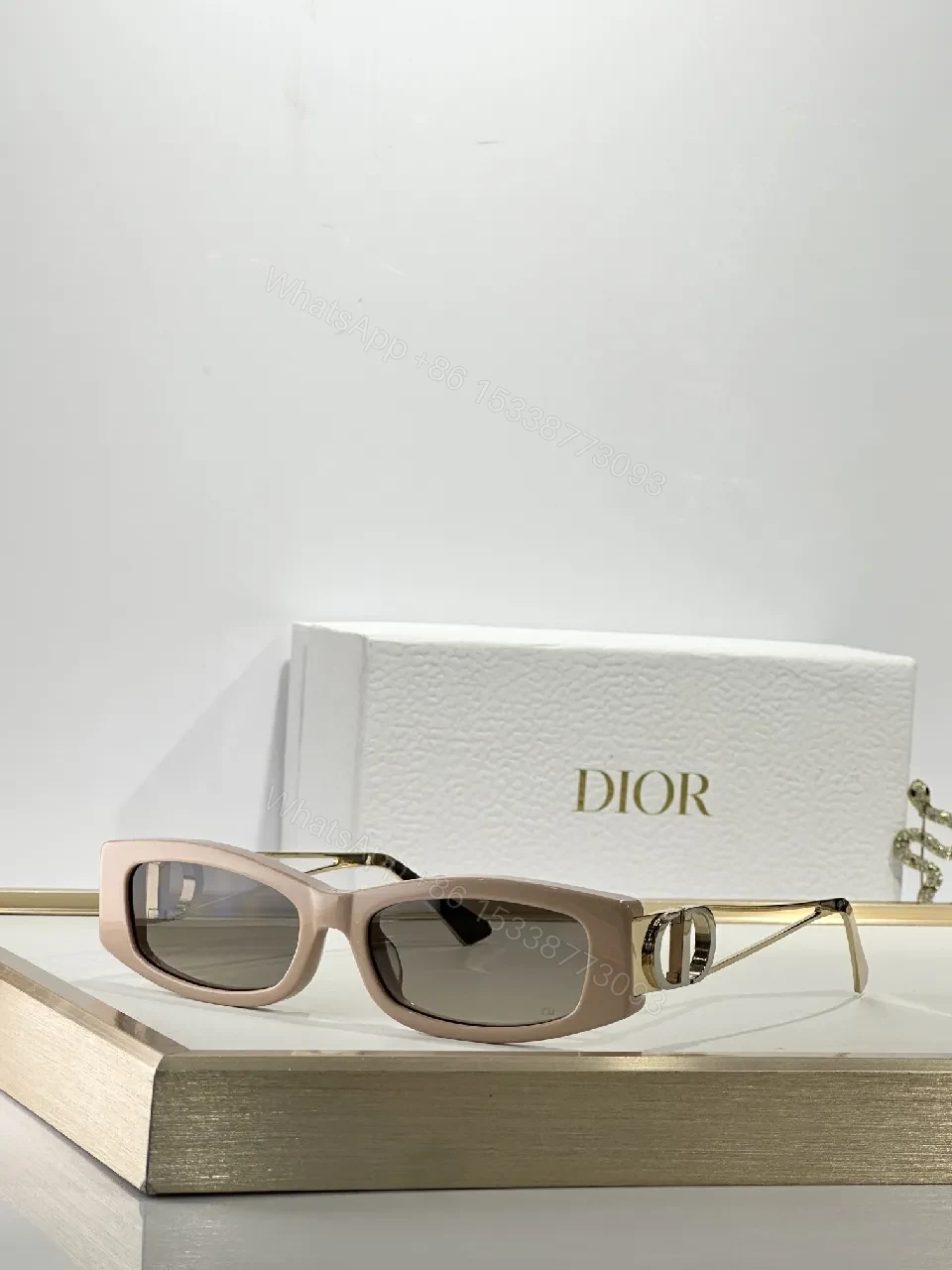 View 7 of White Rectangular Sunglasses with Dior-Gold Accents: Modern Luxury Sideways