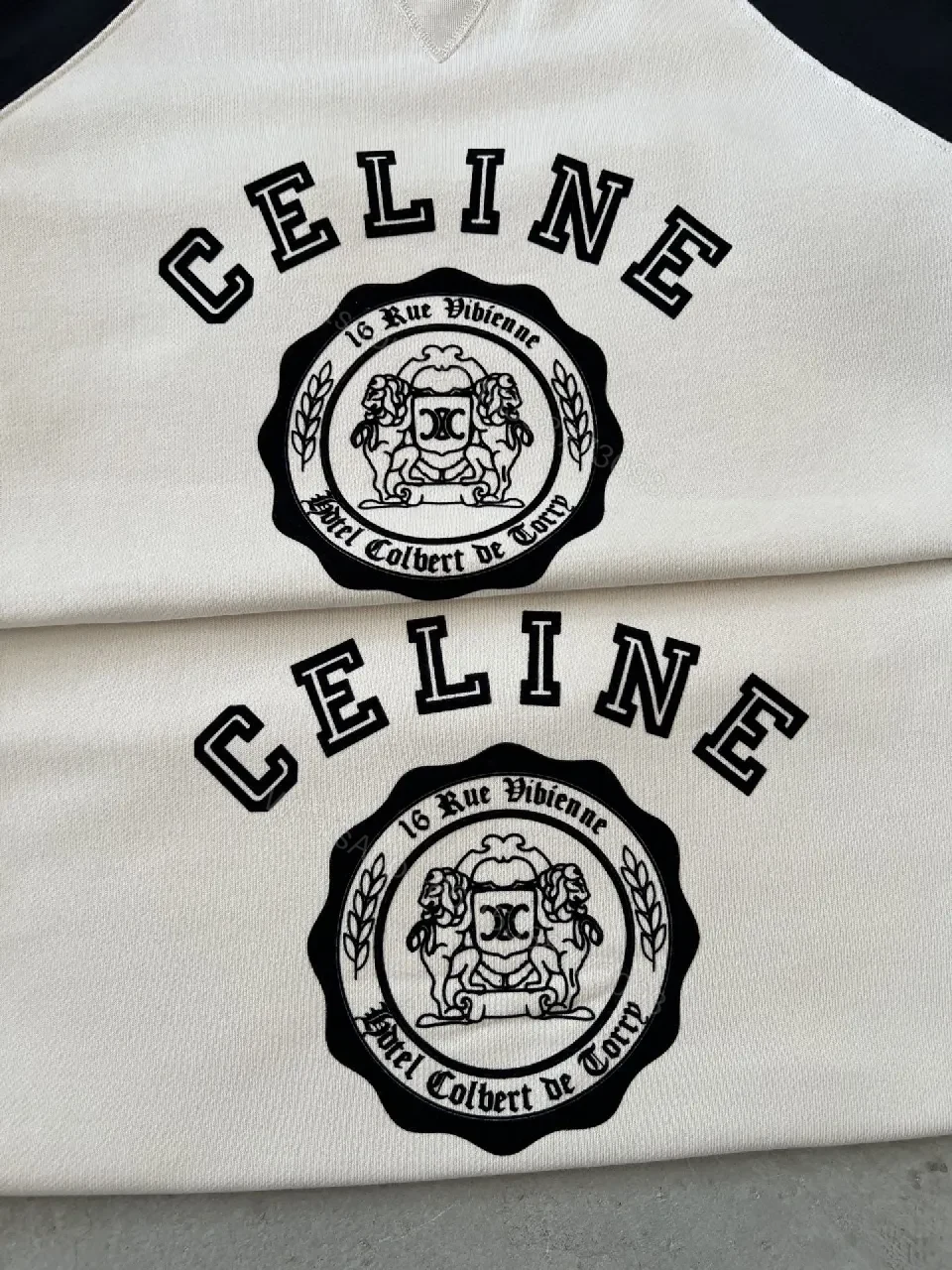 View 8 of Bold Contrast Crest Sweatshirt - Cream Body, Black Sleeves, Luxe Comfort