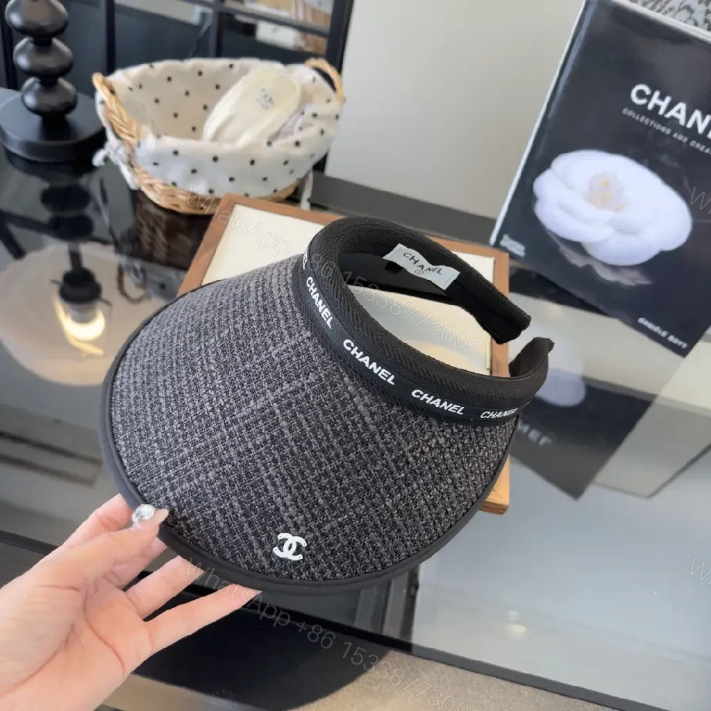 View 7 of Dark Gray Tweed Visor Cap with White Chanel Logo and Silver Emblem