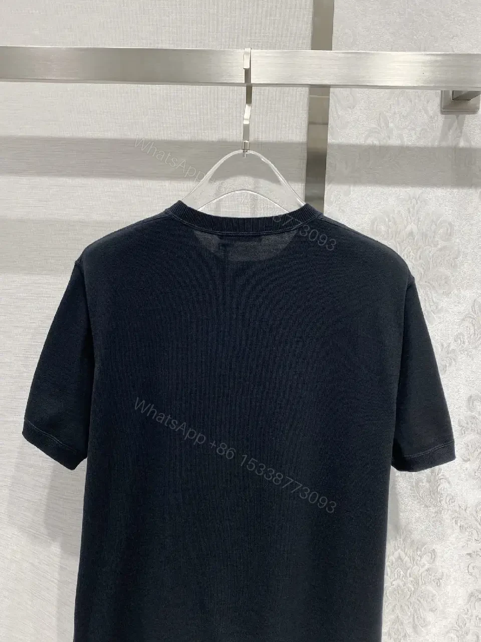 View 8 of Minimalist Cotton Tee with Crest – Elevated Everyday Essential