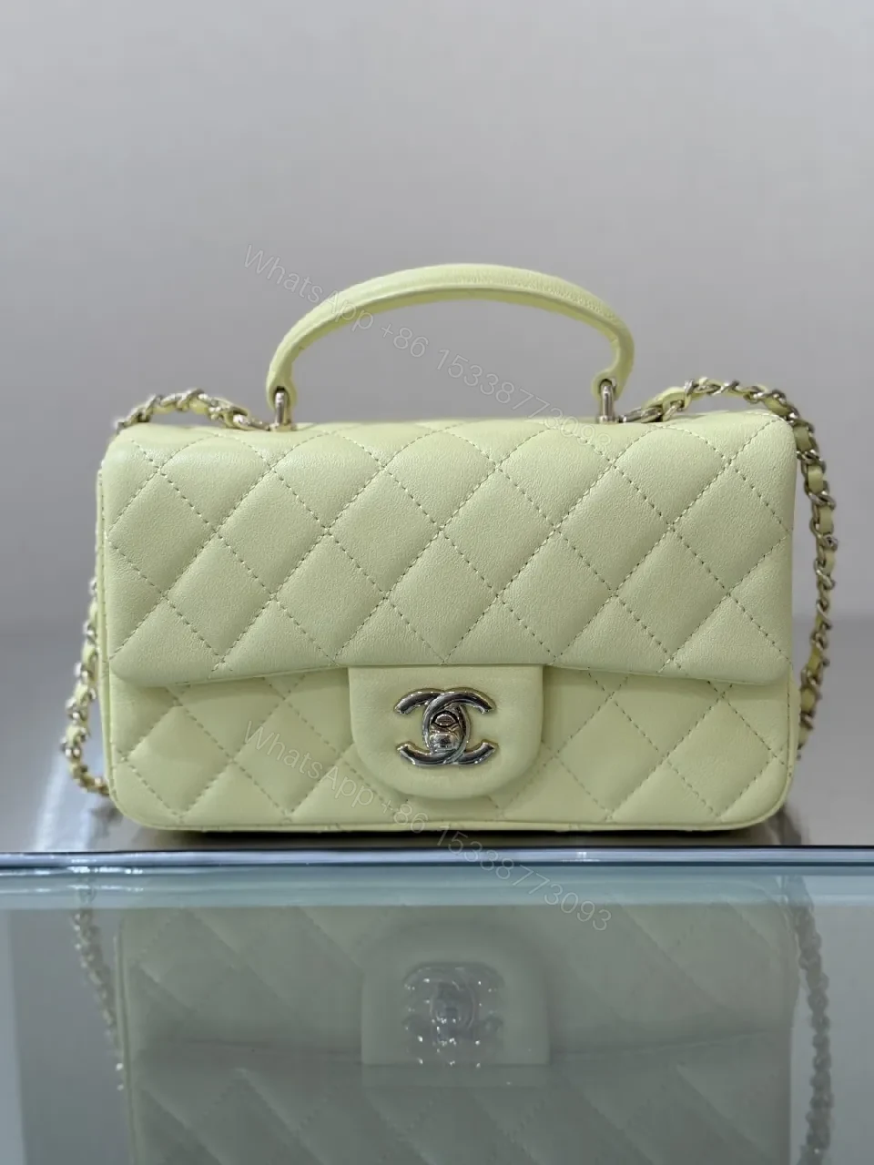 View 3 of Pale Leather Quilted Mini Bag with Chain Detail