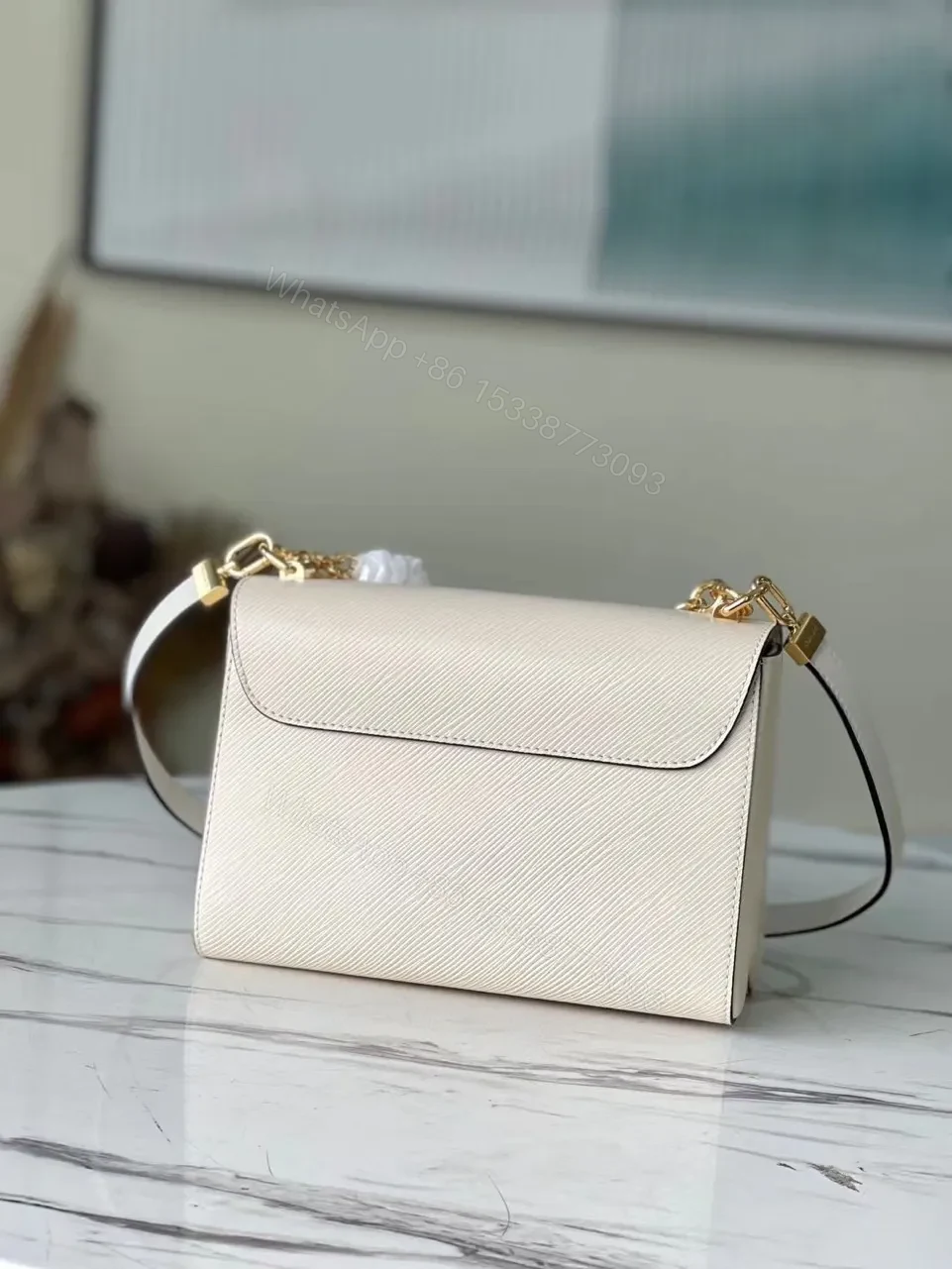 View 9 of Louis Vuitton LV Twist Woman’s Cowhide Leather Handbags 24cm