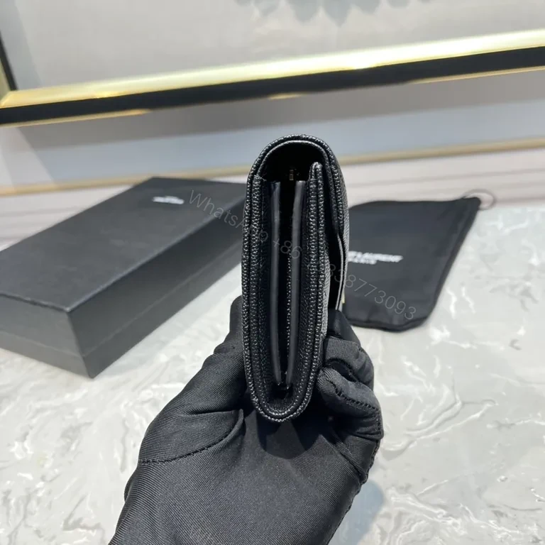 View 4 of Sleek Black Pebbled Leather Envelope Wallet - YSL Signature
