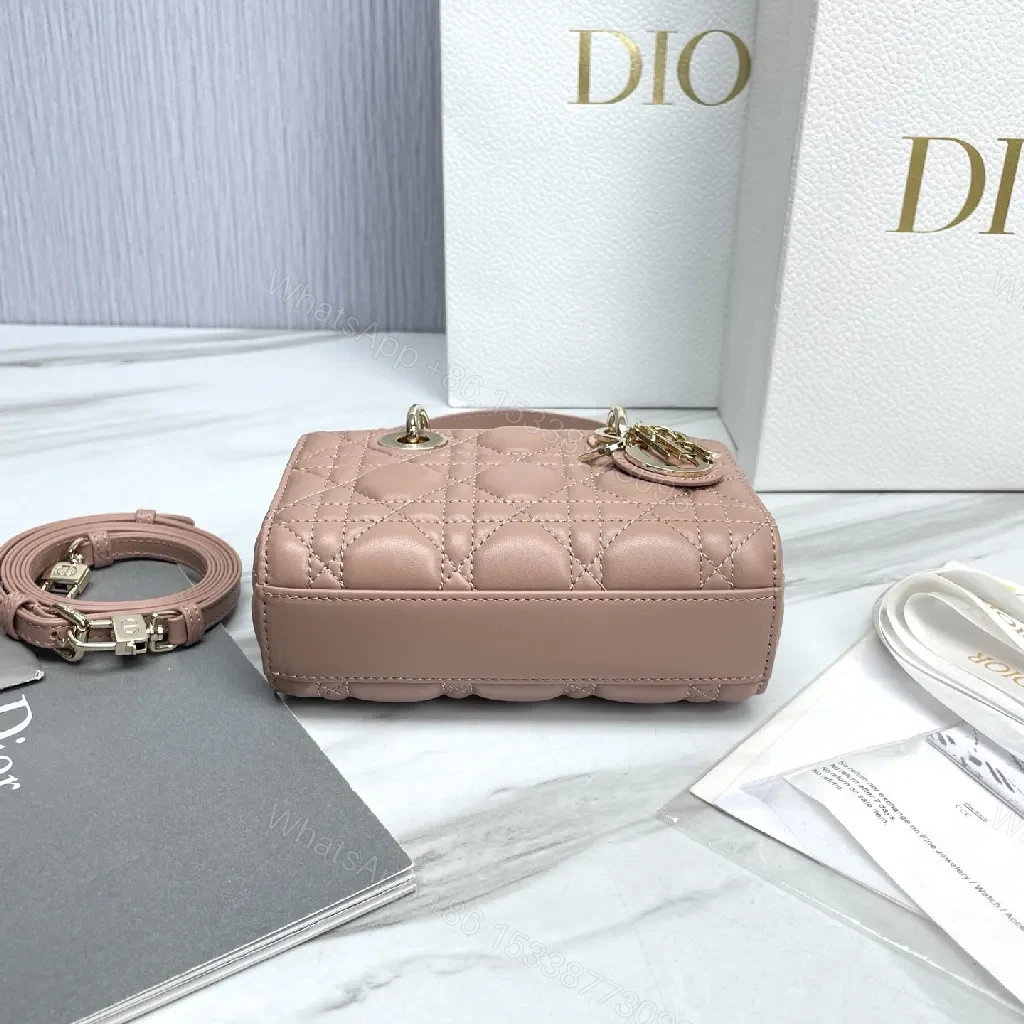View 6 of Soft Pink Quilted Mini Crossbody with Gold Charms - Compact Luxury Bag