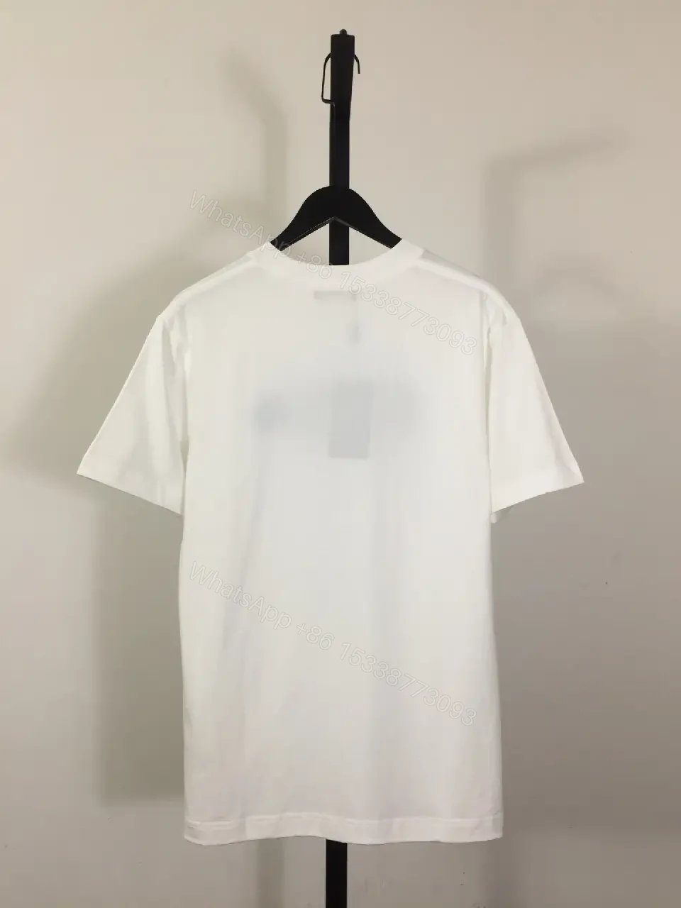 View 6 of White Cotton/Poly blend Short-sleeve Crew Neck Bold FENDI logo with blue flower T-shirt