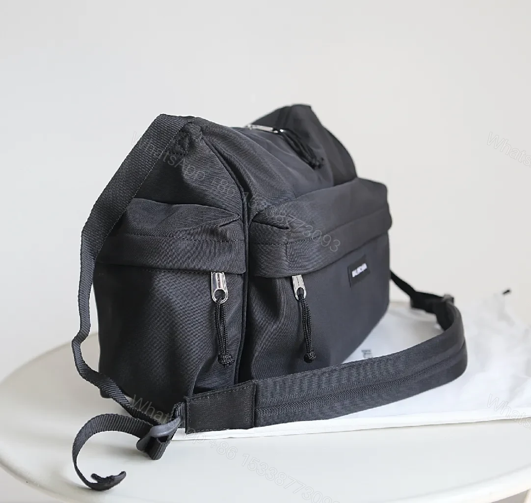 View 9 of Black Nylon Tote, Compact Utility, Minimalist Chic, Water-Resistant, Carryall