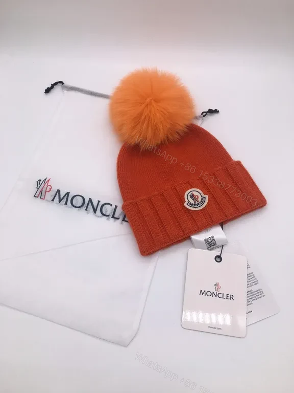 View 5 of Sunny Yellow Moncler Pom Beanie â€“ Luxurious Warmth, Bold Color Pop