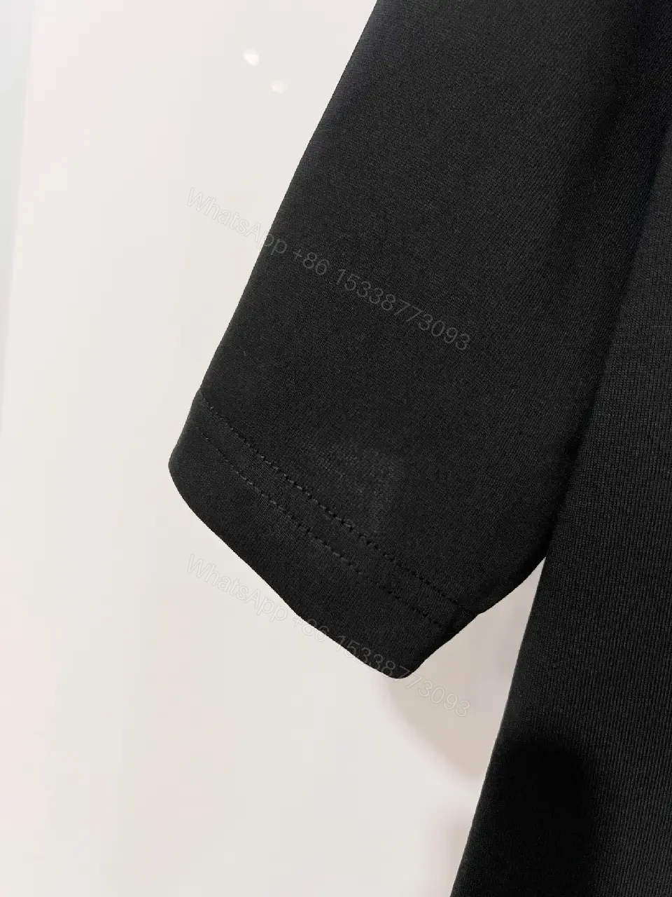 View 11 of Black Cotton Tee Classic – Subtle Emblem, Everyday Luxe